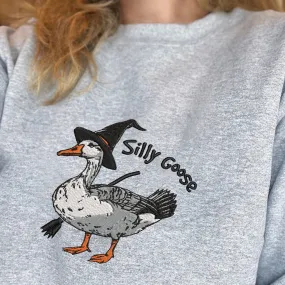 Teesdily | Halloween Goose Witch Embroidered Shirt, Silly Goose Embroidery Sweatshirt, Silly Goose On The Loose Shirt, Funny Goose Halloween Gifts